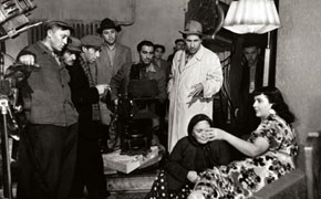 A.Ibrahimov (wearing white raincoat) during the shooting of the film His Great Heart