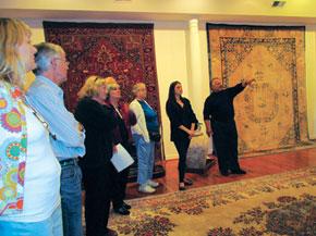 David Zahirpour welcomes guests to his carpet showroom