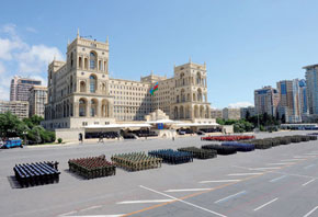 Military Forces on parade before Government House, Baku