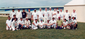 Cricket training - former British Ambassador Andy Tucker is standing in the centre of the back row