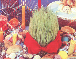 Novruz tray or khoncha with wheat shoots and sweets
