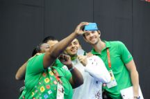 Volunteers take a selfie with zorkhana silver medallist Khayyam Orujov of Azerbaijan, 21 May. Photo: Eldar Farzaliyev