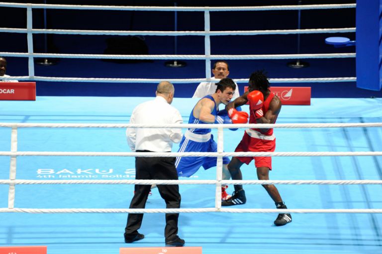 Turkey’s Hakan Dogan (blue) defeats Joel Williamson (red) of Guyana in the men’s lightweight boxing on 12 May. Photo: Eldar Farzaliyev