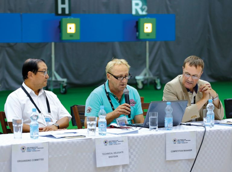 Left to right: Bhattakarka Bunnag (Thailand), ISSF Technical Delegate for Shotgun, Wilhelm Xaver Grill (Germany), OC Competition Manager and Peter Underhill (UK), ISSF Technical Delegate for Rifle/Pistol