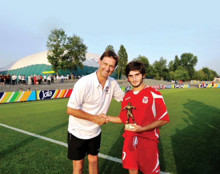 Presenting a trophy to David Razanashvili, the best player at the 2011 1st Jala International Football Tournament in Qabala